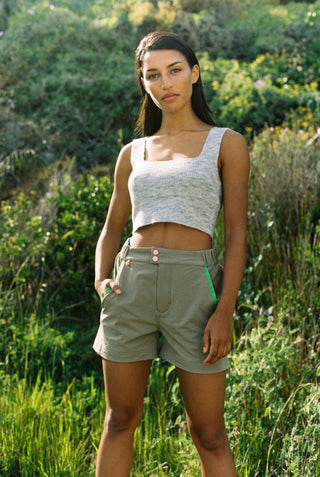 Model wearing the no buns out hiking short in safari